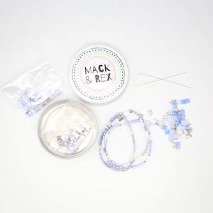 image of the top view of the Lavender Sky DIY Bracelet Kit and some bracelets on a white surface











Lavender Sky DIY Bracelet Kit | Makes 3 Stackable Bracelets | Tila Bead Jewelry Making Kit for Women Teens | Craft Gift for Holidays