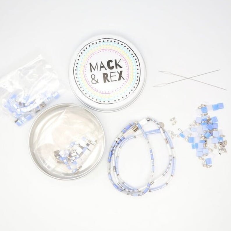 image of the top view of the DIY Bracelet Making Kit and some bracelets on a white surface







DIY Bracelet Making Kit | Makes 3 Bracelets | Beaded Bracelet Kit | Tila Bead Bracelet Kit | Jewelry Making Kit | Adults & Kids Craft Beads