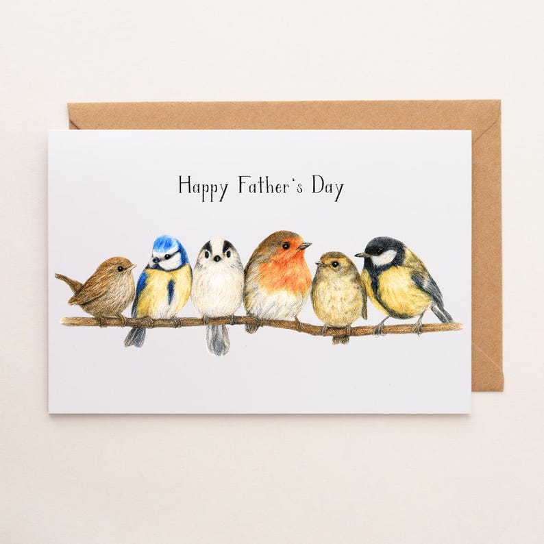 May include: A Father's Day card with a brown envelope. The card shows a watercolour illustration of six birds of different colours perched on a branch. The words "Happy Father's Day" are written above the birds.