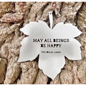 Beautiful metalic leaf decoration. Quote - "May All Beings Be Happy" The Dalai Lama. Perfect for homes and outside garden yard use.