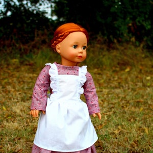 Pionier Puppenkleid mit angebrachter Schürze für 18 Zoll Puppe