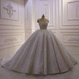 Delicate Shimmering Lace Wedding Gown With Sweetheart Bodice