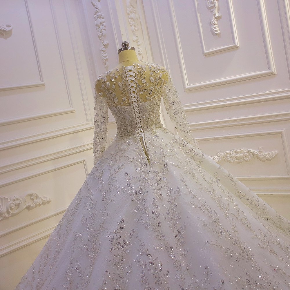 Graceful Weddings' Shimmering Lace and Sequin Masterpiece for Unforgettable Occasions main image 1