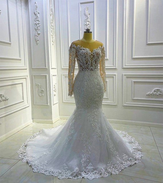 Long sleeve sheath clearance wedding dress with beading