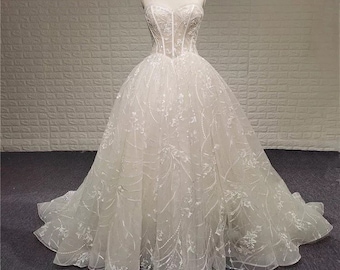 Custom-made strapless romantic princess ballgown wedding dress. Luxury embroidered and beading lace fairy wedding dress with sweetheart