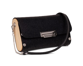 The Cruise Clutch Rubber Handbag, from recycled rubber & wood, black vegan handbag, black clutch handbag and black wristlet handbag