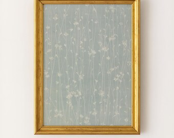 May include: A rectangular wall art piece featuring a vertical print of delicate white wildflowers on a soft sage green background, encased in a polished gold-toned frame with a classic profile and subtle distressed texture along the edges.
