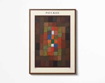 May include: Framed art print featuring a colorful abstract composition by Paul Klee. The artwork is composed of various rectangular shapes in shades of brown, red, green, and blue. The print is set against a cream-colored background and framed in a dark wood.