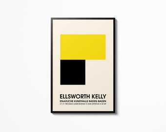 May include: A framed art print featuring a minimalist design with a yellow rectangle above a black square on a cream background. The print includes the name "ELLSWORTH KELLY" and other text.