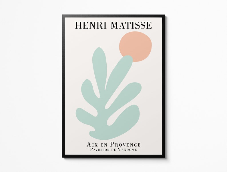 May include: A minimalist art print featuring a stylized green leaf and a peach-colored circle. The print is titled "Henri Matisse" and includes the text "Aix en Provence, Pavillon de Vendome".