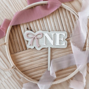 Coquette One Year Cake Topper | Baby Girl 1st Birthday | One Year Cake Topper for Girls | Ribbon Bow Cake Topper | Wooden Topper