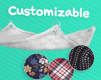 May include: A light gray pet hammock with metal rings and the text "Customizable". Three fabric swatches show floral, plaid, and geometric patterns. The hammock is designed for small pets.