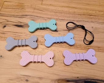 Silicone Dog Bone chew pendant - *NOT FOR DOGS*