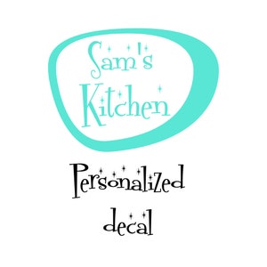 May include: A turquoise blue oval with the text "Sam's Kitchen" in a stylised font. Below the oval is the text "Personalized decal" in black.