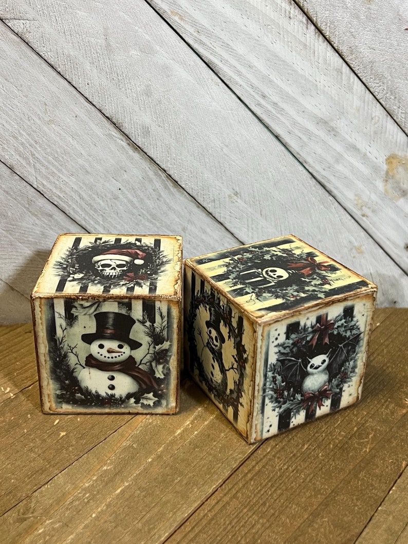 Dark goth christmas decor, blocks with skulls, bats, snowmen in dark christmas style