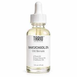 May include: A clear glass dropper bottle of Tario Skincare Bakuchiol 2% Oil Serum. The white label features black text reading Tario Skincare, Bakuchiol 2% Oil Serum, Plum Oil, Sour Cherry Oil, Safflower Oil, and 1 fl. oz. | 29 mL. It has a white dropper cap.