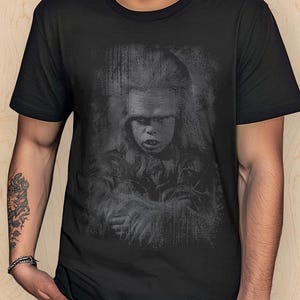 May include: A white ceramic mug with a black handle and the text "But First, Coffee" in a bold, black font. The mug is set against a neutral background, highlighting its simple design.