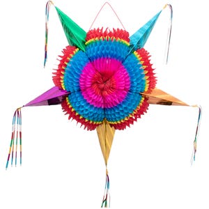 May include: A multi-pointed star-shaped piñata featuring a central honeycomb paper design in vibrant layers of hot pink, bright blue, and red. The star points are constructed from metallic foil in green, purple, orange, and blue, with hanging ribbons.