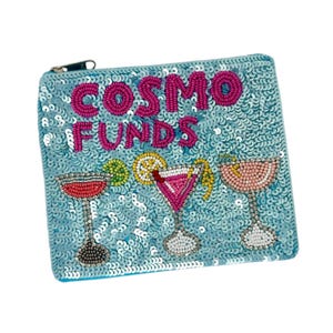 May include: A light blue sequined cosmetic bag with the words "COSMO FUNDS" in pink beaded letters. The bag features beaded cocktail glasses in red, pink, and peach. A fun accessory for storing makeup or small items.