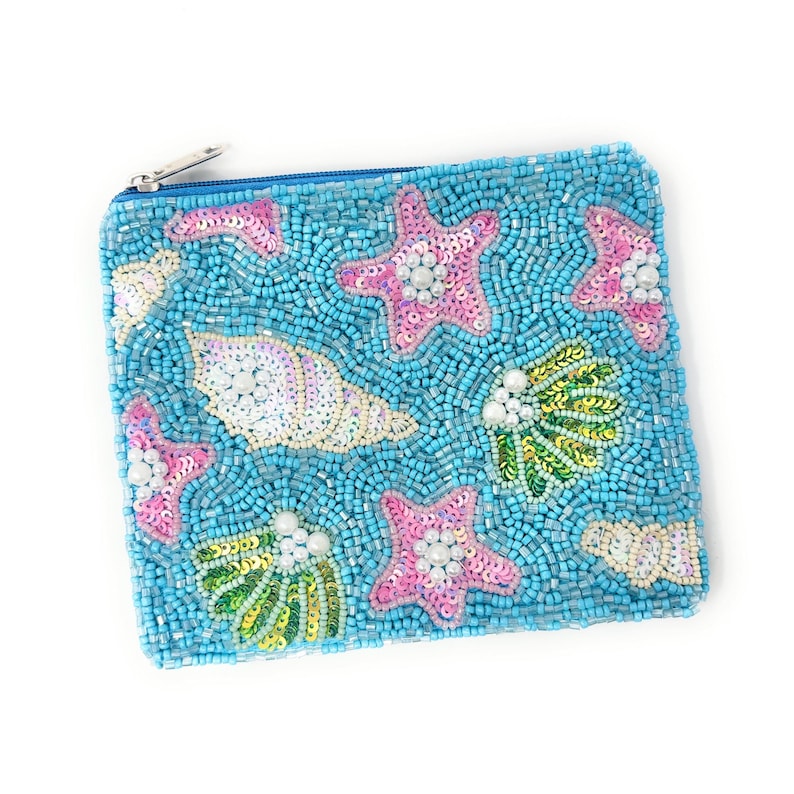 Blue beaded pouch with starfish, shells, and coral designs on a white background