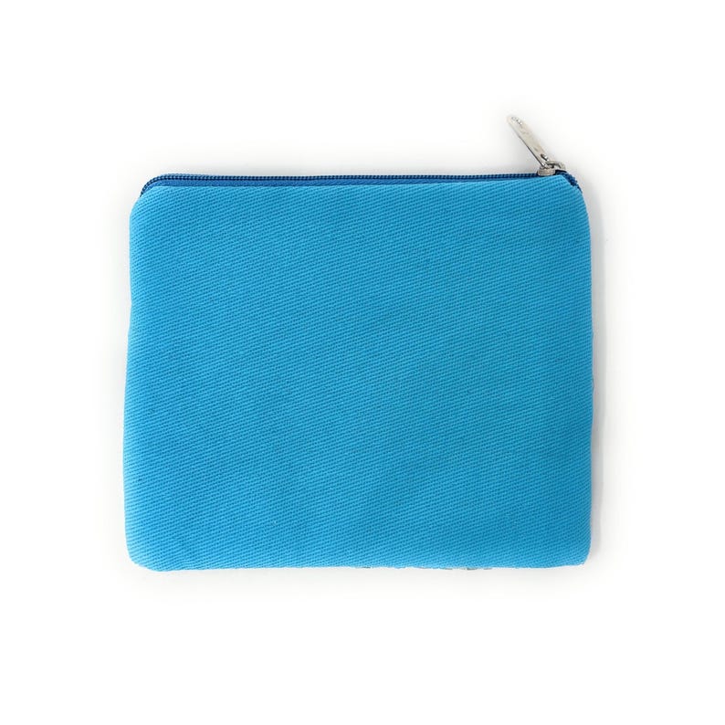 May include: A square, turquoise-colored pouch with a zipper closure. The pouch is made of a textured fabric and has a matching blue zipper and trim. The zipper pull is silver-colored.