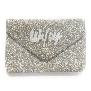 Elegant Hand-Beaded Custom Bridal Clutch Purse: The Perfect Accessory for Your Special Day - WIFEY Silver clutch with white letters