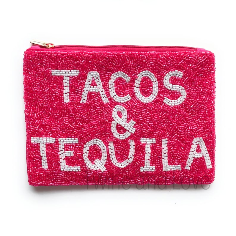 May include: A pink beaded zippered pouch with the text "TACOS & TEQUILA" in white beads.