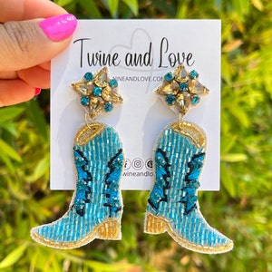 Handmade Light blue Cowgirl boots with gold border.