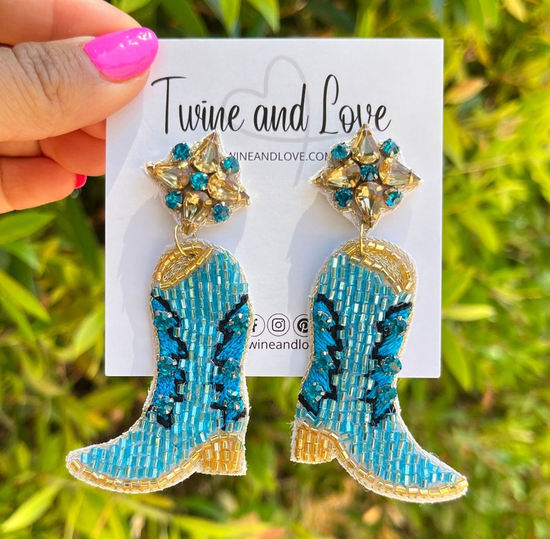 Handmade Light blue Cowgirl boots with gold border.