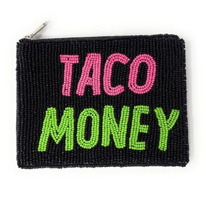 May include: Black beaded coin purse with the words "TACO MONEY" in pink and green beads. The purse has a silver zipper and a rectangular shape. The beads are tightly packed, creating a textured surface.