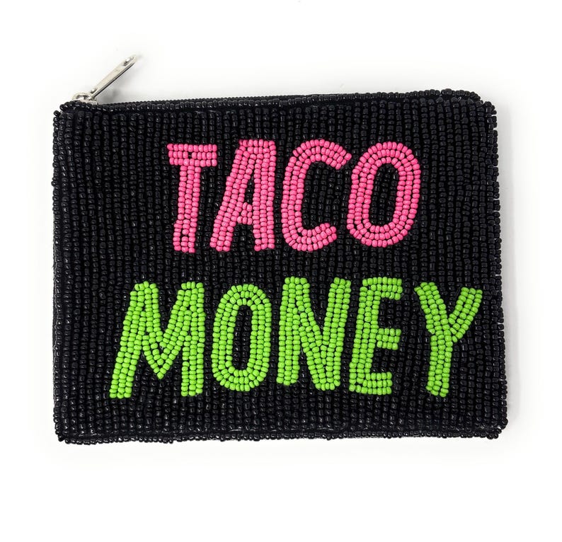 May include: Black beaded coin purse with the words "TACO MONEY" in pink and green beads. The purse has a silver zipper and a rectangular shape. The beads are tightly packed, creating a textured surface.