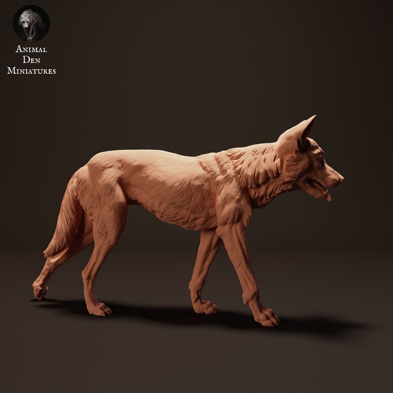 May include: A detailed, unpainted, terracotta-colored miniature sculpture of a wolf walking with its head turned to the side. The wolf is sculpted with realistic fur details.