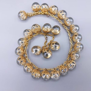 1960s Stunning Art Deco Natural Rock Crystal &quot;Pools of Light&quot; Undrilled Orb Dangle Repousse Gold tone Necklace 112 grams