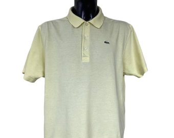 Polo Lacoste Sport Devanlay vintage de algodón amarillo brillante de los años 90. Talla: 7 / XXL