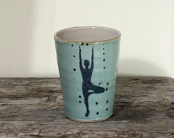 Handmade ceramic drinking cups for hot and cold drinks with a yoga motif, yoga cups in turquoise with an asana motif: tree