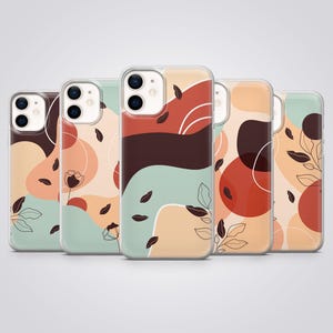 May include: Five smartphone cases featuring abstract designs with organic shapes in shades of terracotta, sage green, cream, and dark brown. The patterns include thin black line art of flowers and leaves scattered across the surface, with each case displaying a unique arrangement of these colorful shapes and botanical illustrations.