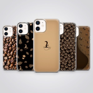 May include: Five phone cases with coffee-related designs. The cases display images of coffee beans, leaves, and a coffee cup with steam. The cases are in shades of brown and black, with a clear case in the middle.