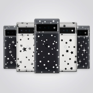 May include: Five phone cases with star patterns. The cases have a clear, protective design. The star patterns vary, including black stars on white, white stars on black, and starburst designs. The cases are for a Google Pixel phone.