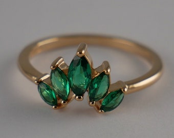 Gold plated thin ring for women with green zirconium oxide