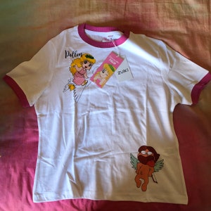 Camiseta oficial con licencia de Pollon y Eros de edición limitada