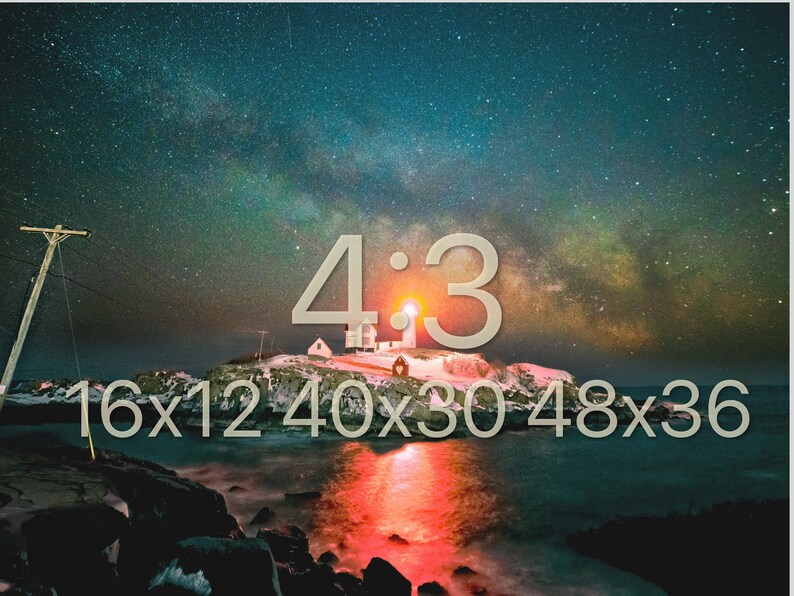 May include: A lighthouse on a small island with a snowy landscape, illuminated by a bright red light. The Milky Way is visible in the night sky above. The text "4:3 16x12 40x30 48x36" is displayed below the lighthouse.