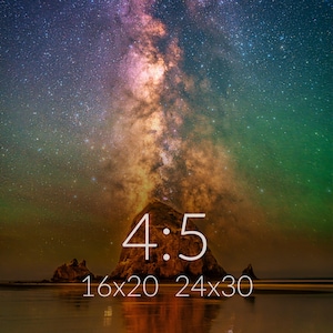 May include: A night sky photograph featuring the Milky Way galaxy above a large rock formation on a beach. The image displays the text 4:5, 16x20, and 24x30 in white font. The scene includes vibrant purple, orange, and green hues in the starry sky.