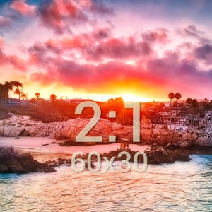 May include: A scenic sunset over a rocky beach with a vibrant pink and orange sky. The text "2:1 60x30" is superimposed on the image.
