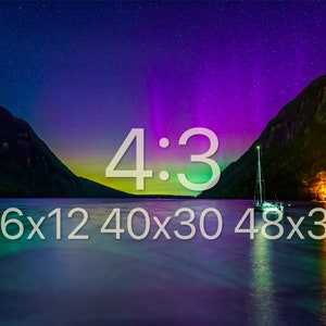 May include: A scenic landscape photograph featuring a lake with a sailboat, mountains, and a vibrant night sky illuminated by the aurora borealis. The image is labeled with the aspect ratio 4:3 and dimensions 16x12, 40x30, and 48x36.
