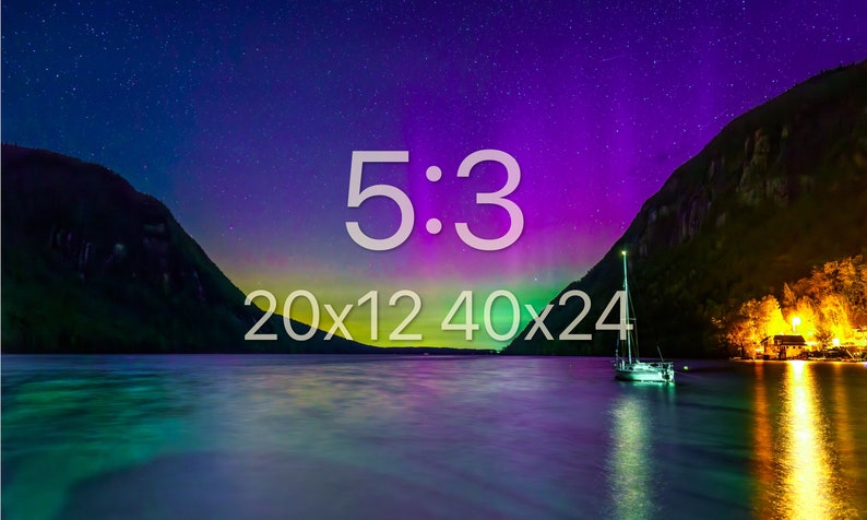 May include: A scenic landscape featuring a lake with a sailboat, mountains, and a vibrant night sky with the text "5:3 20x12 40x24". The sky transitions from purple to green, with a starry background.