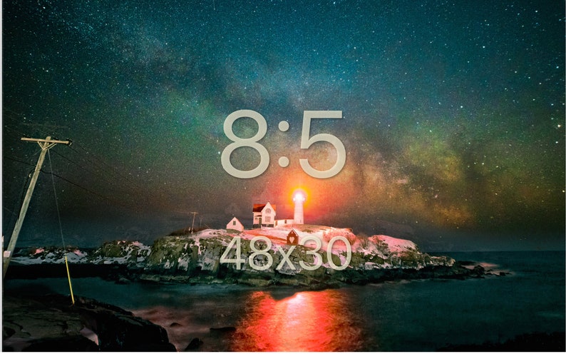 May include: A lighthouse on a rocky island with a starry night sky and the Milky Way visible. The lighthouse is lit up and the water is reflecting the light. The text "8:5" and "48x30" is superimposed on the image.