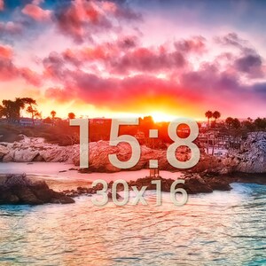 May include: A scenic sunset over a rocky coastline with a beach in the foreground. The sky is a vibrant mix of pink, orange, and blue with fluffy clouds. The text "15:8 30x16" is superimposed on the image.