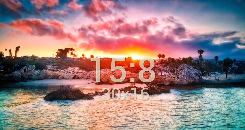 May include: A scenic sunset over a rocky coastline with a beach in the foreground. The sky is a vibrant mix of pink, orange, and blue with fluffy clouds. The text "15:8 30x16" is superimposed on the image.