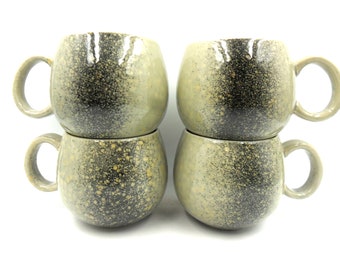 4 x Reactive Glaze Cuddly Stoneware Sphere Mugs in Dewy Green with speckled Shadow.