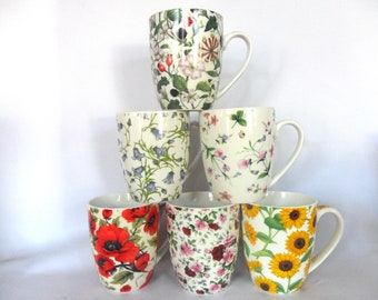 Set of 6 assorted floral design aspen mugs.